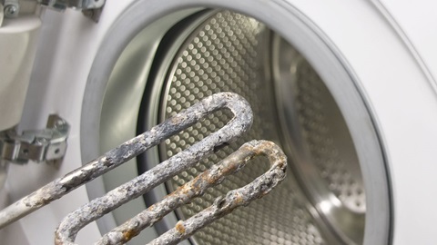 Calcaire sur la résistance d'une machine à laver